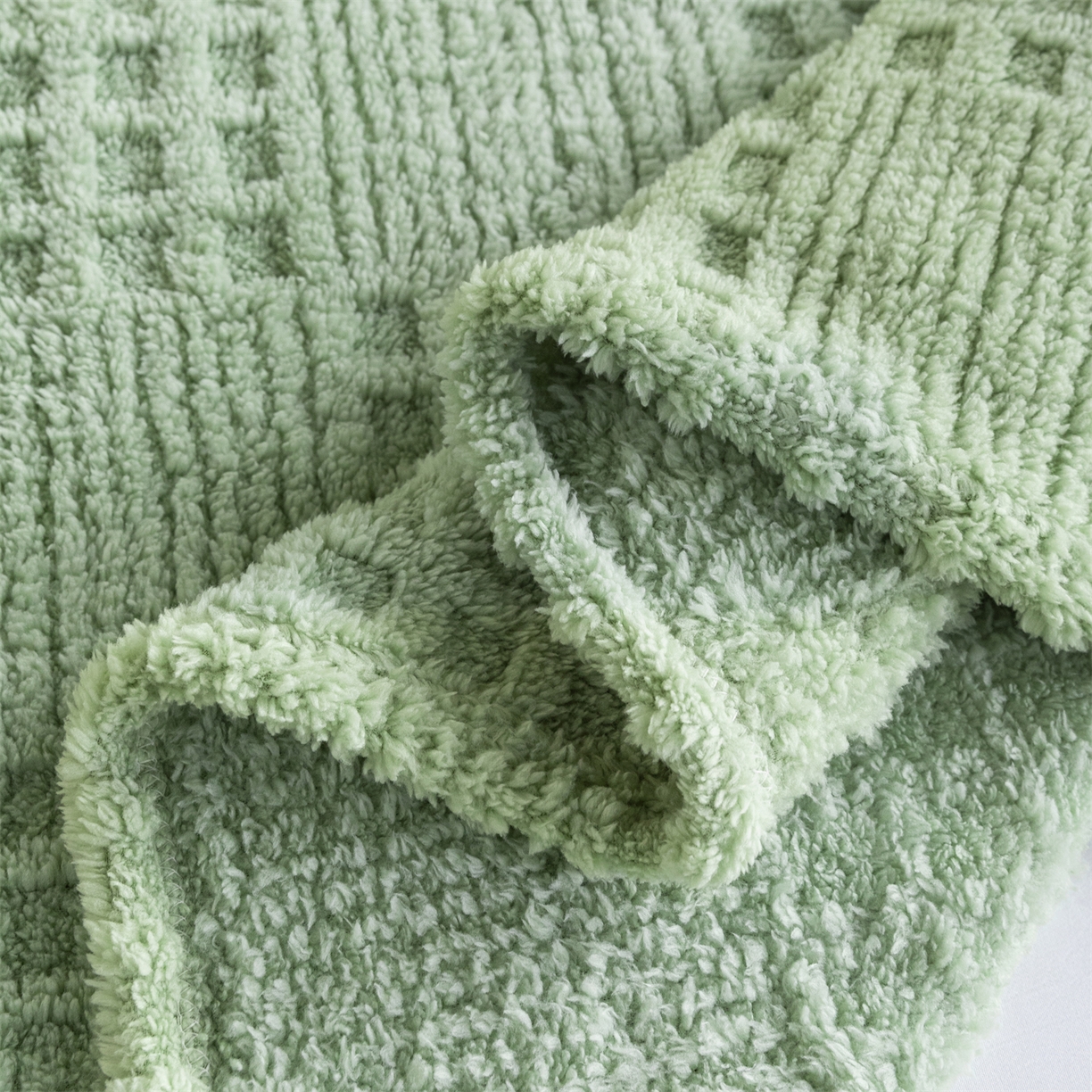 91家纺网 家纺一手货源 找家纺 （总）梵心家纺 2025新款塔芙绒纯色华夫格提花毛毯多功能舒棉绒盖毯午睡毛毯-跨境电商