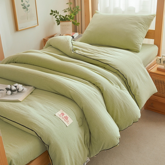 91家纺网 家纺一手货源 找家纺 熙宴家纺 2025新款水洗棉嵌绳款100%新疆棉花被 豆绿