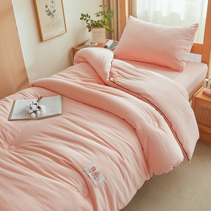 91家纺网 家纺一手货源 找家纺 熙宴家纺 2025新款水洗棉嵌绳款100%新疆棉花被 粉玉