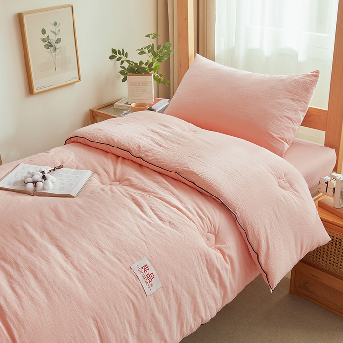 91家纺网 家纺一手货源 找家纺 熙宴家纺 2025新款水洗棉嵌绳款100%新疆棉花被 粉玉