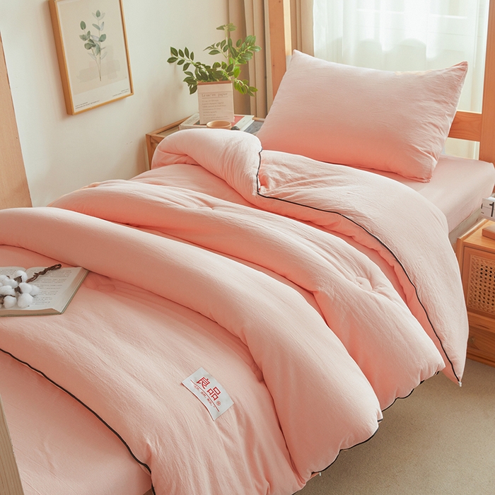 91家纺网 家纺一手货源 找家纺 熙宴家纺 2025新款水洗棉嵌绳款100%新疆棉花被 粉玉