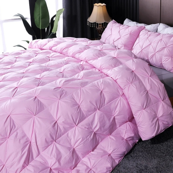 四川牛皮席 2025新款温暖轻盈东北95白鹅绒被扭花款 200*230-6斤 粉色