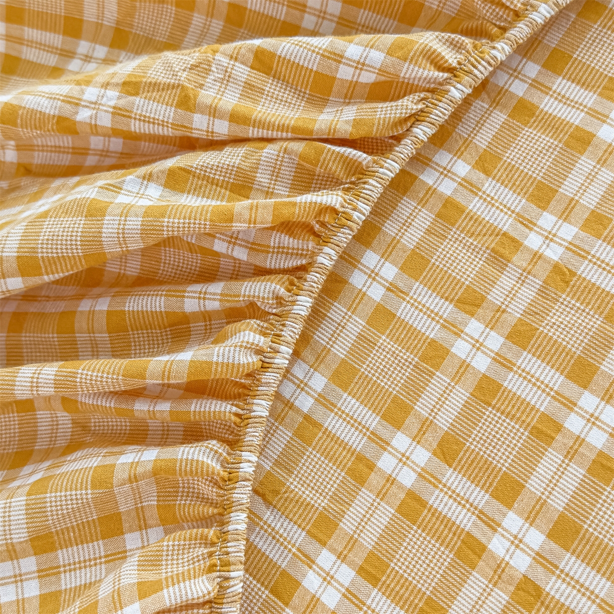 91家纺网 家纺一手货源 找家纺 菡宝 2025新款全棉纯棉色织水洗棉单单床笠 黄格调