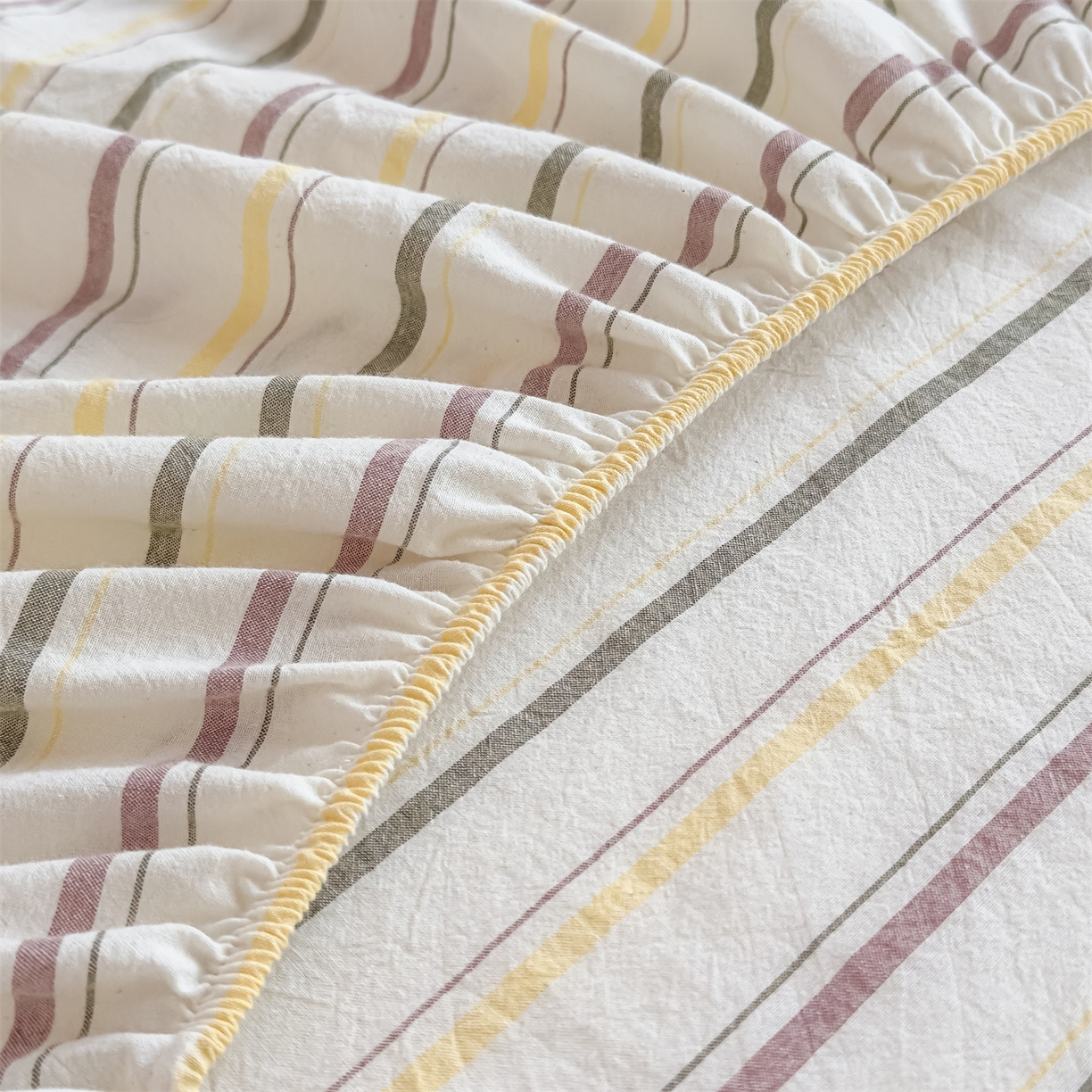 91家纺网 家纺一手货源 找家纺 菡宝 2025新款全棉纯棉色织水洗棉单单床笠 且乐紫青年