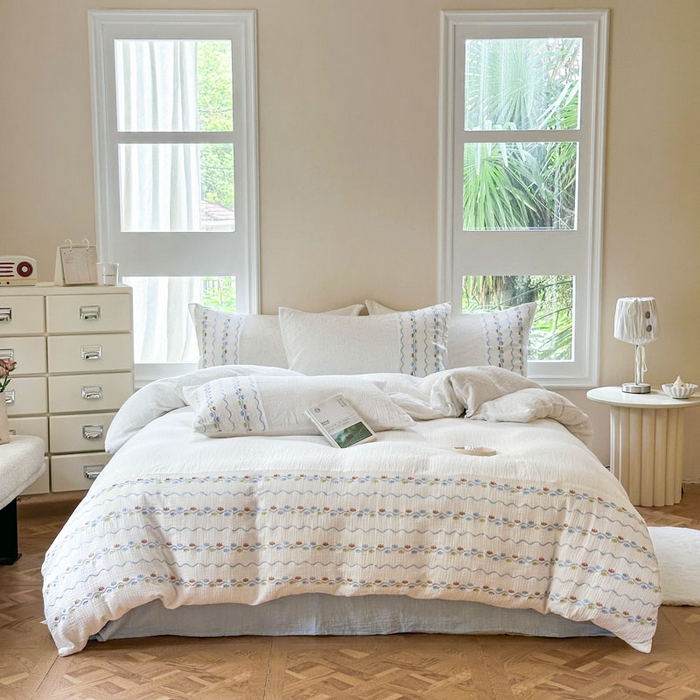 91家纺网 家纺一手货源 找家纺 木楌家居2025新款全棉彩点皱皱纱绣花四件套 织梦星河