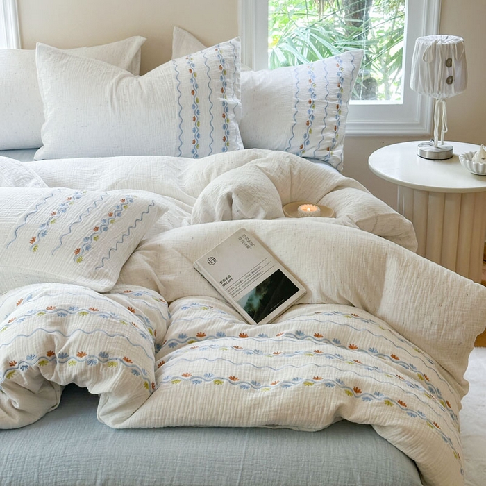 91家纺网 家纺一手货源 找家纺 木楌家居2025新款全棉彩点皱皱纱绣花四件套 织梦星河