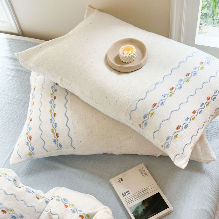 91家纺网 家纺一手货源 找家纺 木楌家居2025新款全棉彩点皱皱纱绣花四件套 织梦星河