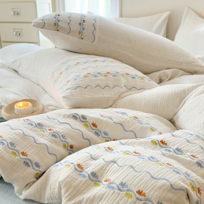 91家纺网 家纺一手货源 找家纺 木楌家居2025新款全棉彩点皱皱纱绣花四件套 织梦星河