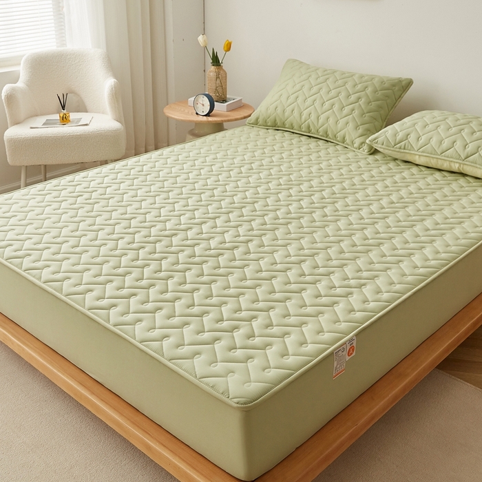 91家纺网 家纺一手货源 找家纺 蕾诺家纺 2025新款纯棉全包裹床罩防滑防尘夹棉床笠 波浪纹绿色