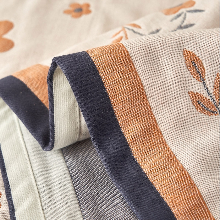 91家纺网 家纺一手货源 找家纺 朴尔家纺-毛巾被2025新款全棉四层纱布休闲枕巾 纷飞花雨-驼