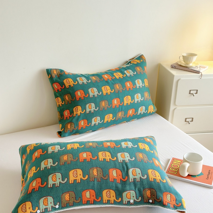 91家纺网 家纺一手货源 找家纺 朴尔家纺-毛巾被2025新款半包可调节暗扣魔术全棉三层纱布枕巾 多彩小象-绿黄