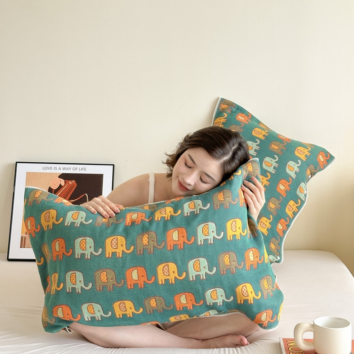 91家纺网 家纺一手货源 找家纺 朴尔家纺-毛巾被2025新款半包可调节暗扣魔术全棉三层纱布枕巾 多彩小象-绿黄