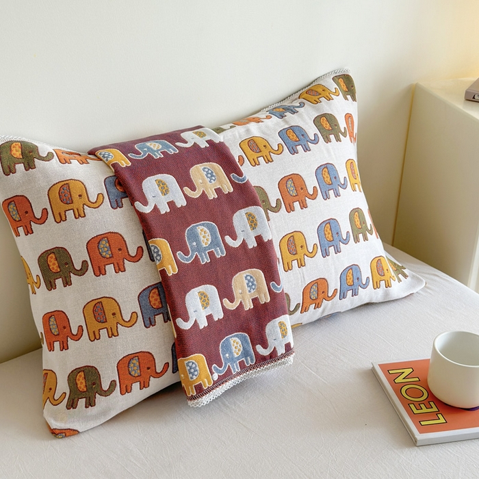 91家纺网 家纺一手货源 找家纺 朴尔家纺-毛巾被2025新款半包可调节暗扣魔术全棉三层纱布枕巾 多彩小象-米白