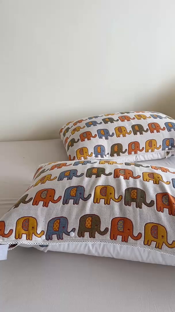 91家纺网 家纺一手货源 找家纺 朴尔家纺-毛巾被2025新款半包可调节暗扣魔术全棉三层纱布枕巾 多彩小象-米白