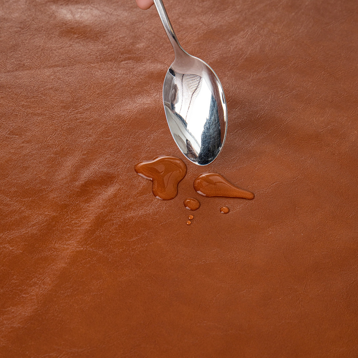 91家纺网 家纺一手货源 找家纺 沐沐家纺 2025新款油蜡皮桌布 橙色