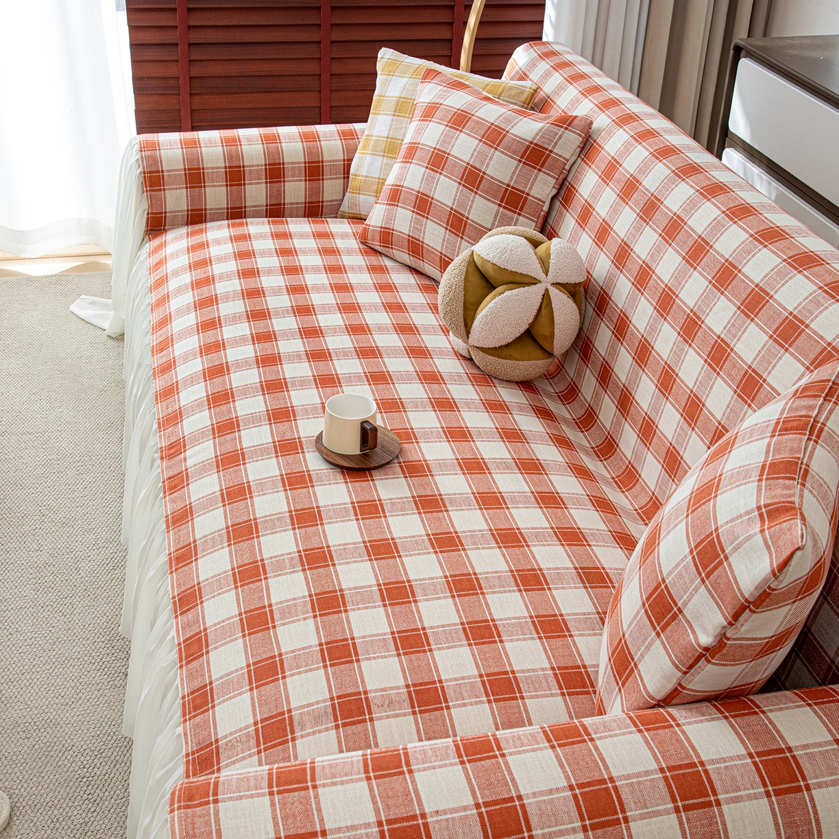 91家纺网 家纺一手货源 找家纺 沐沐家纺 2026新款棋格裙边沙发巾 橘棋格