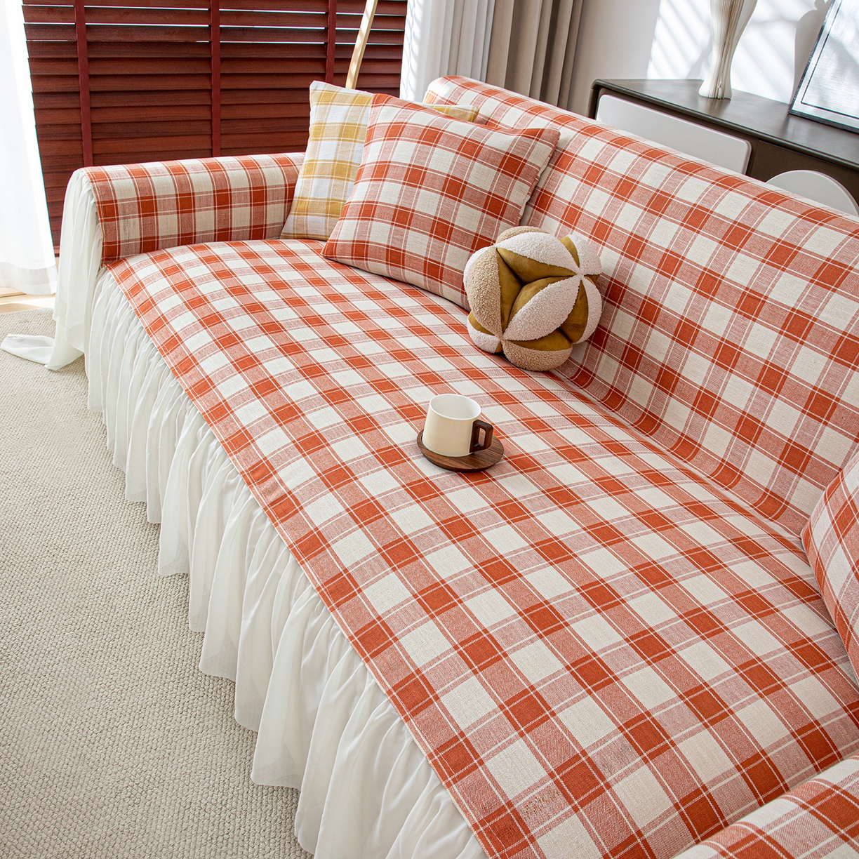 91家纺网 家纺一手货源 找家纺 沐沐家纺 2026新款棋格裙边沙发巾 橘棋格