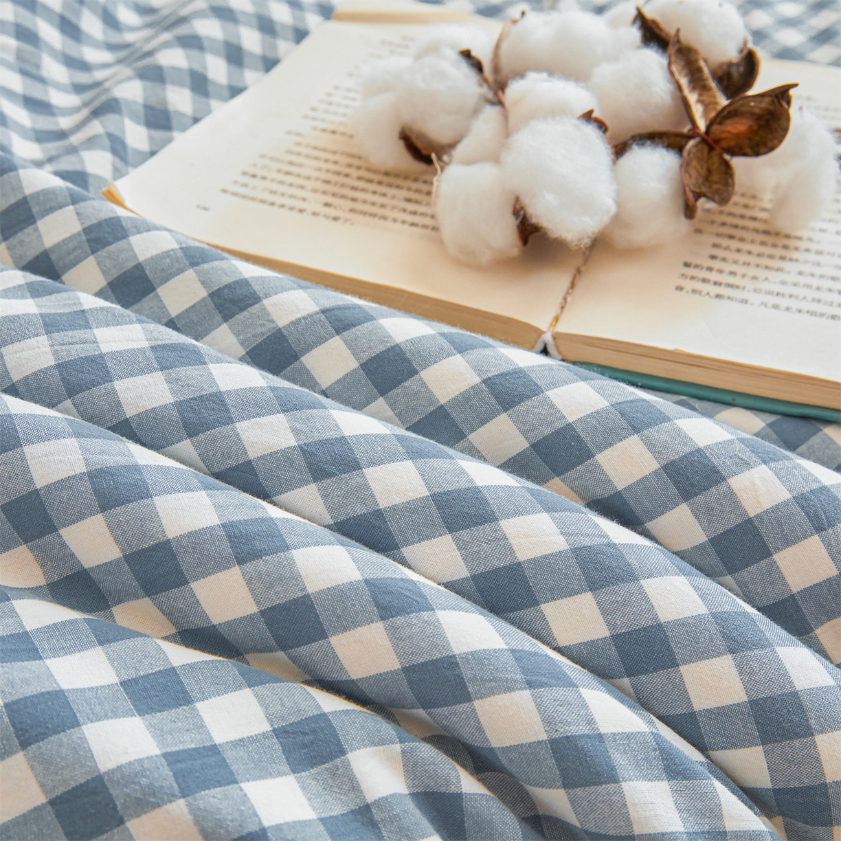 91家纺网 家纺一手货源 找家纺 梵蒂莎 2025新款可拆卸棉花被（场景1） 海盐小格