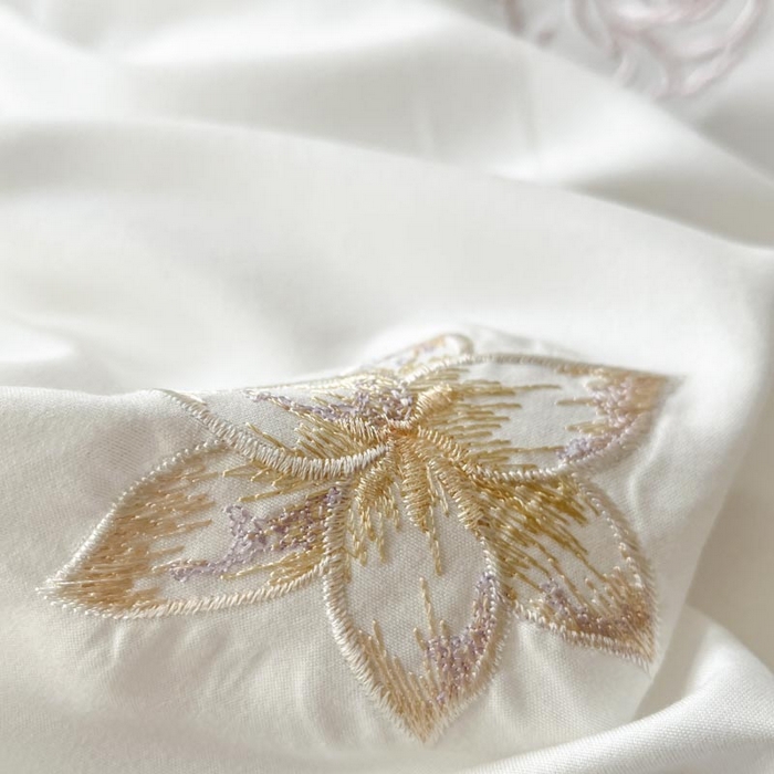 91家纺网 家纺一手货源 找家纺 AB家纺2025新款 水洗棉绣花四件套 依兰梦 浅紫白