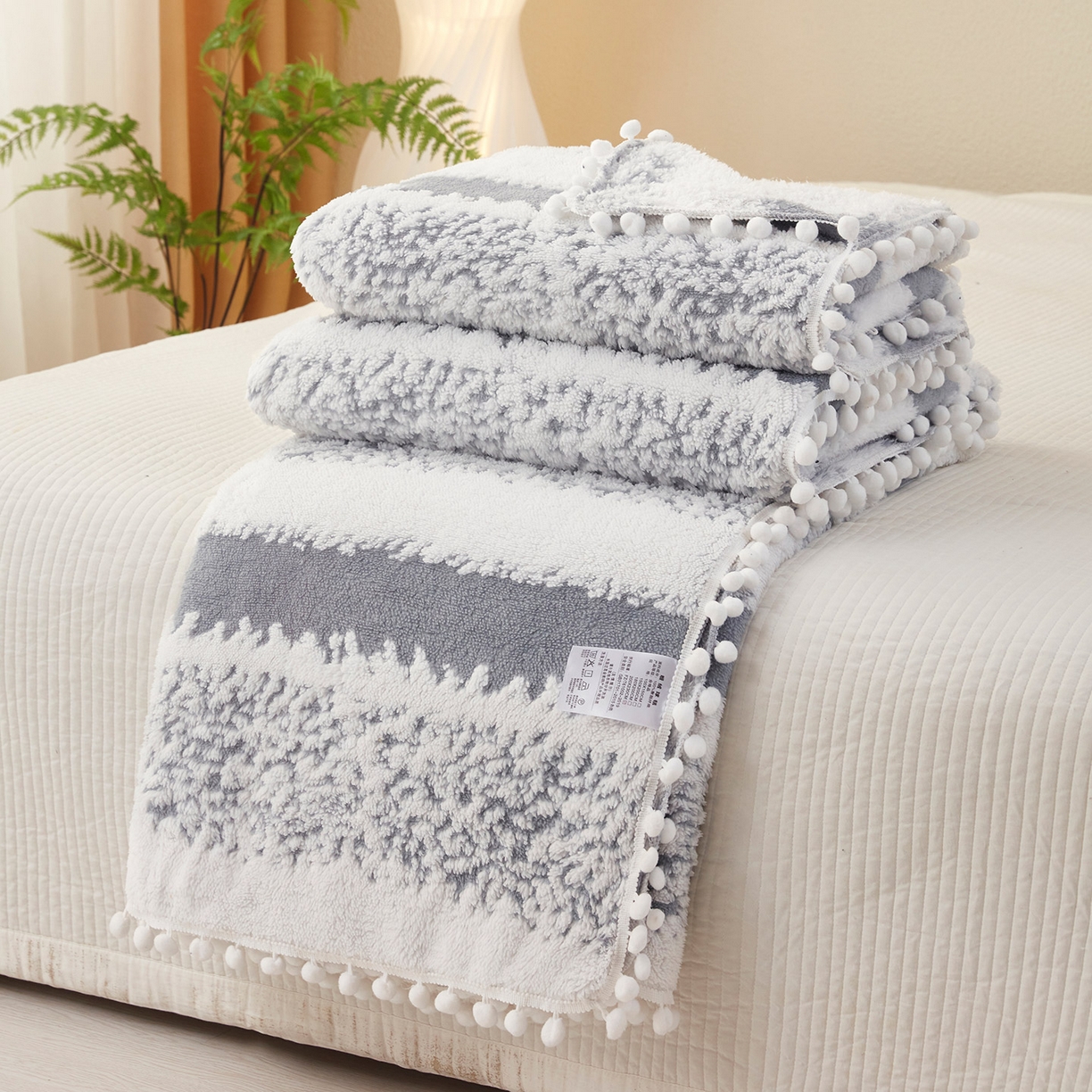 91家纺网 家纺一手货源 找家纺 莱家富 2026新款跨境专供外贸出口300克重双面条纹阳离子提花毛球毛毯盖毯休闲小毯子冬季床单 雪球梦语烟灰