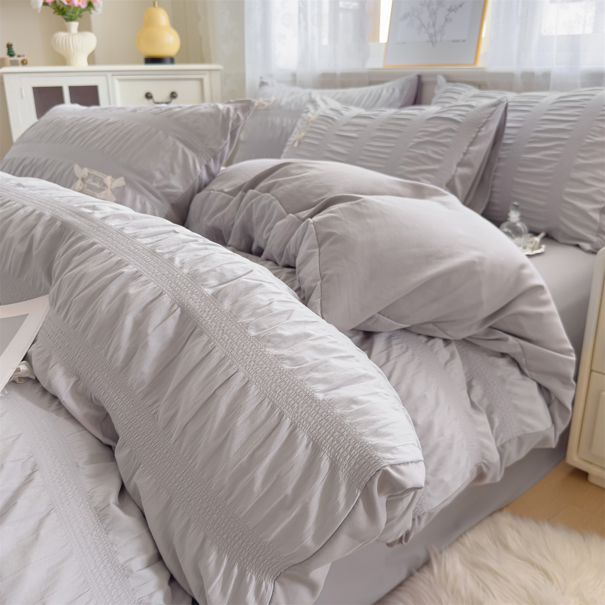 91家纺网 家纺一手货源 找家纺 梦庭帛美 2025新款韩版公主风可乐泡泡纱四件套 樱花粉