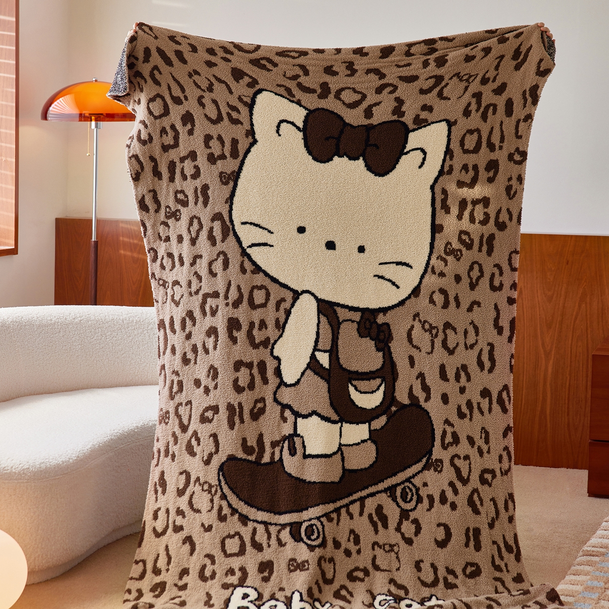 91家纺网 家纺一手货源 找家纺 安莱生活 2025新款设计师款半边绒多功能盖毯 滑板猫-咖