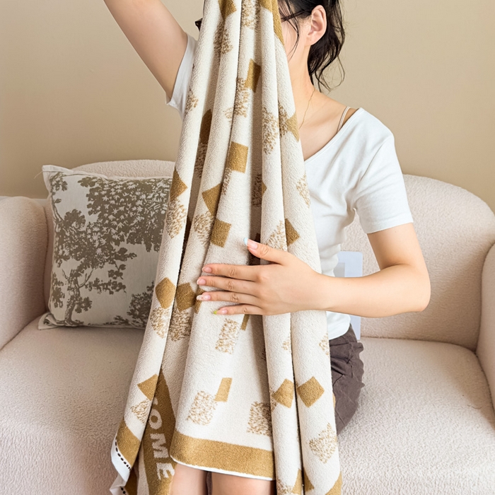 91家纺网 家纺一手货源 找家纺 悦然毛巾被 2025新款全棉毛圈浴巾盖毯 方格咖70*140