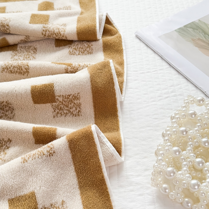 91家纺网 家纺一手货源 找家纺 悦然毛巾被 2025新款全棉毛圈浴巾盖毯 方格咖70*140