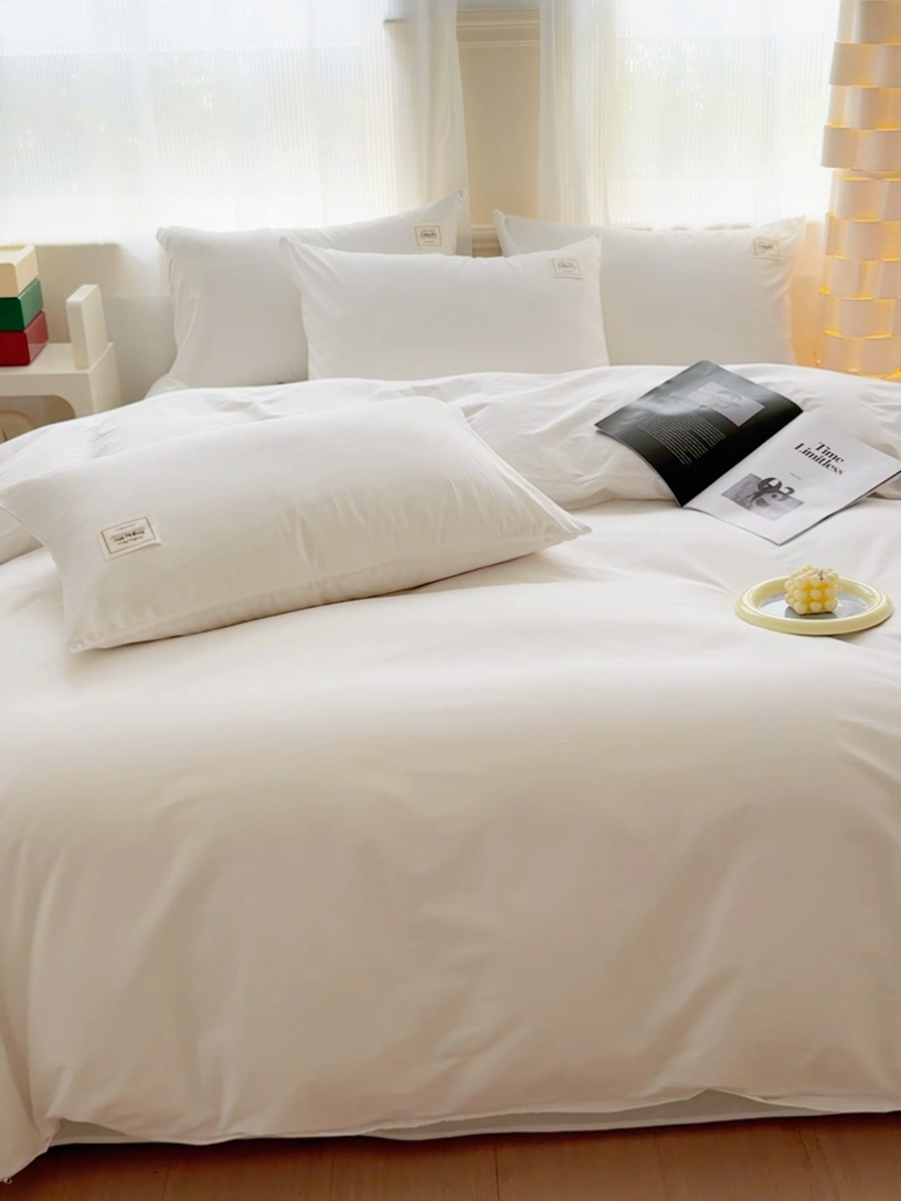 91家纺网 家纺一手货源 找家纺 花香四季家纺 2025新款全棉13376纯棉素色四件套系列床单床笠枕套单品 奶油白