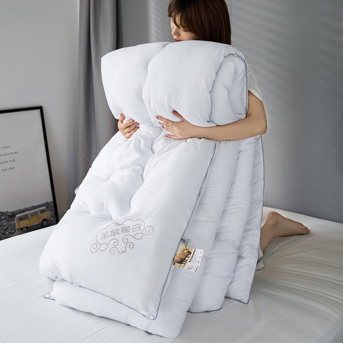 91家纺网 家纺一手货源 找家纺 VIP被业 2025新款简约无味纯色羊毛被冬被被子被芯 白色