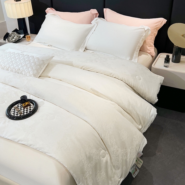 91家纺网 家纺一手货源 找家纺 VIP被业 2025新款简约60S全棉纯棉提花立体大豆子母被被子被芯 白色