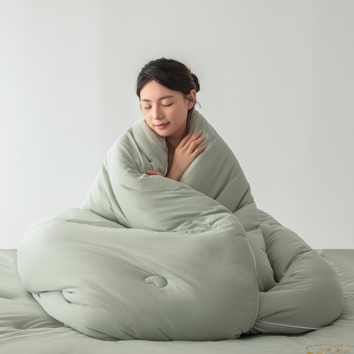 91家纺网 家纺一手货源 找家纺 栩裕纺织 2025新款纯色超柔云朵针织被被子被芯冬被 云朵被-草绿色