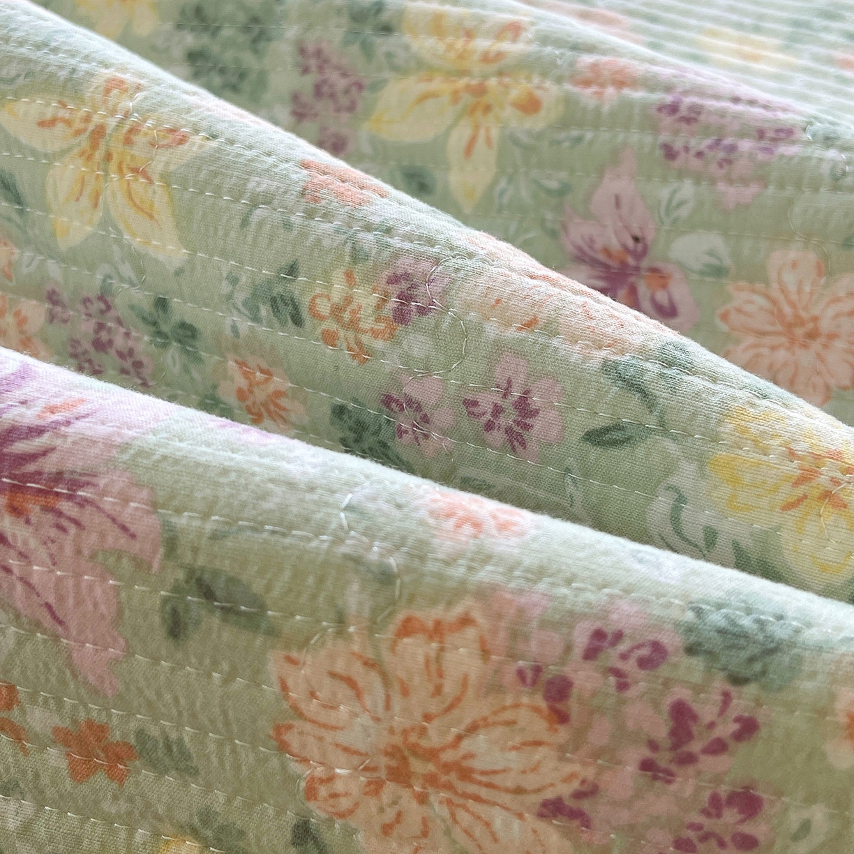 91家纺网 家纺一手货源 找家纺 雨彤家纺 2025新款A类双层纱夹棉单人枕巾 浅若花落