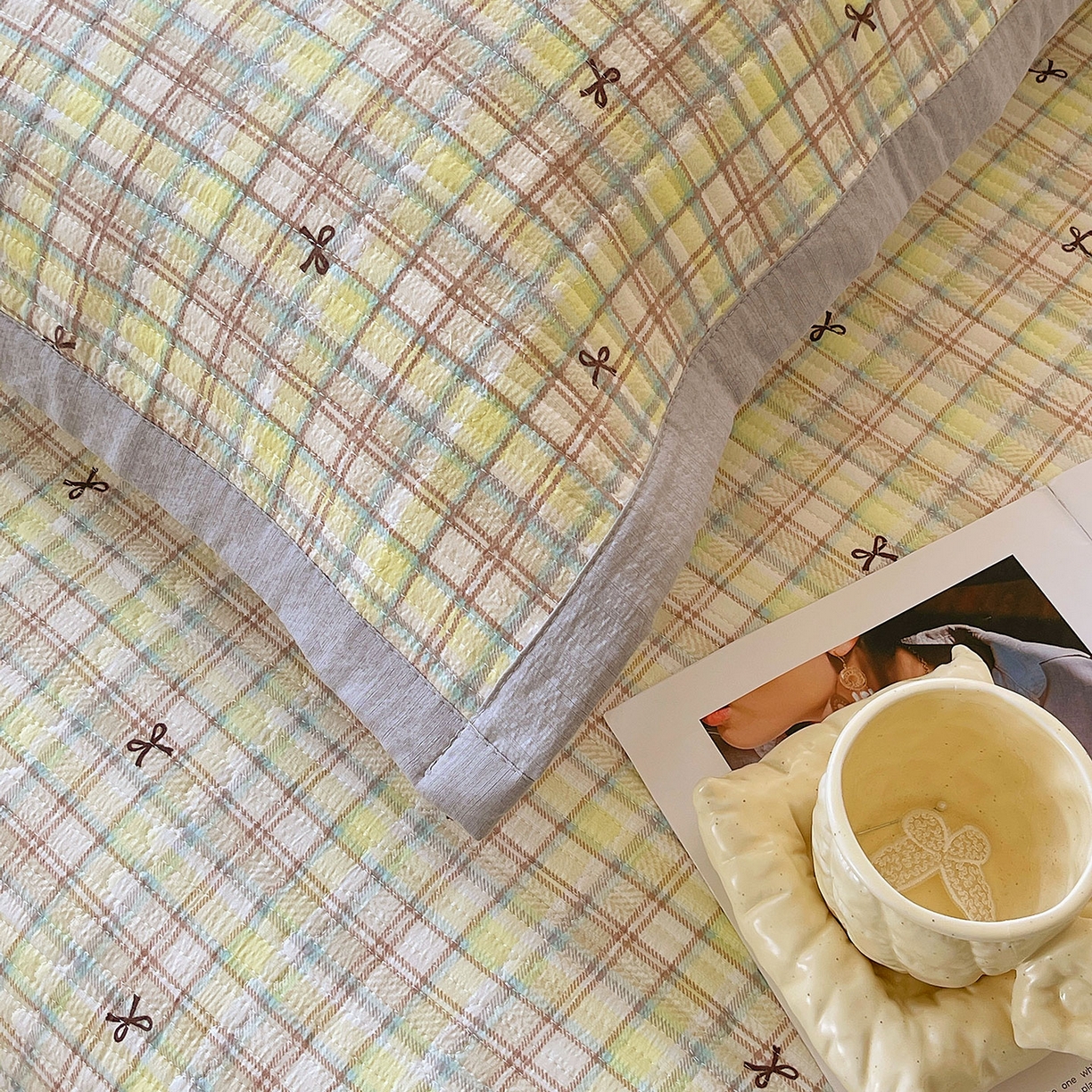 91家纺网 家纺一手货源 找家纺 雨彤家纺 2025新款A类双层纱夹棉单人枕巾 格调蝴蝶结