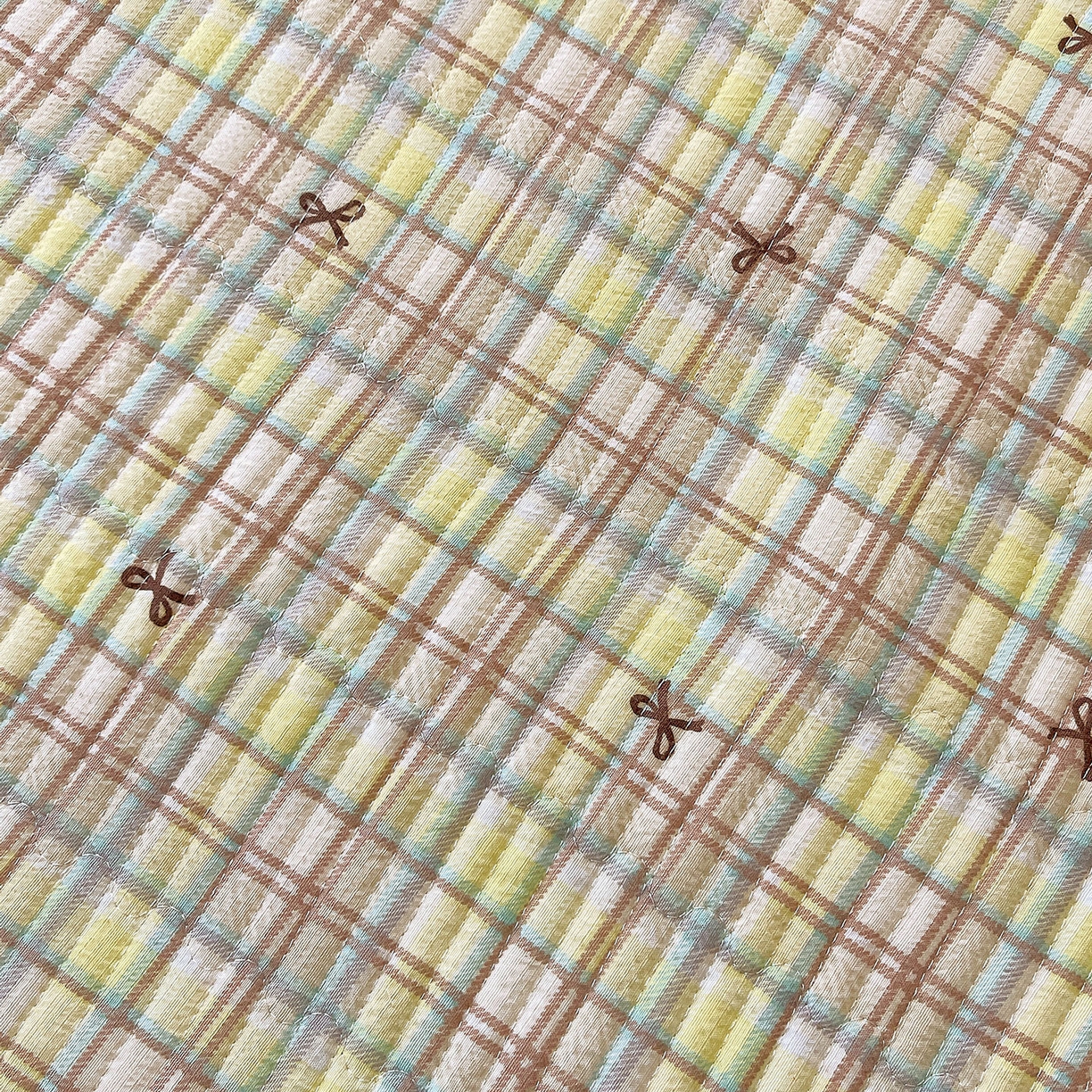 91家纺网 家纺一手货源 找家纺 雨彤家纺 2025新款A类双层纱夹棉单人枕巾 格调蝴蝶结