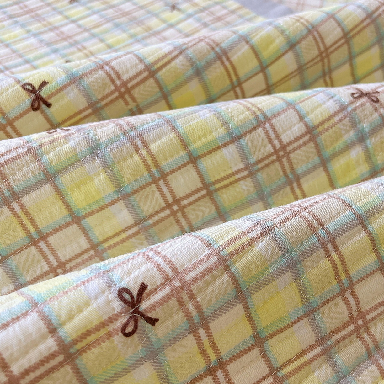 91家纺网 家纺一手货源 找家纺 雨彤家纺 2025新款A类双层纱夹棉单人枕巾 格调蝴蝶结