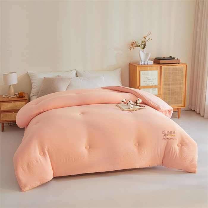 91家纺网 家纺一手货源 找家纺 锦逸家居 2025新款A类水洗棉100%新疆棉花被棉絮春秋被冬被被子被芯 玉粉色