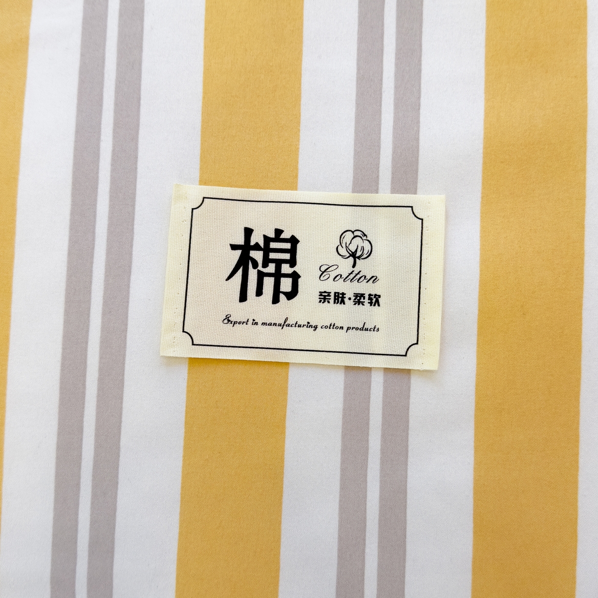 91家纺网 家纺一手货源 找家纺 默忆 2025新款新疆棉学生棉花被 被子被芯 橙灰宽条