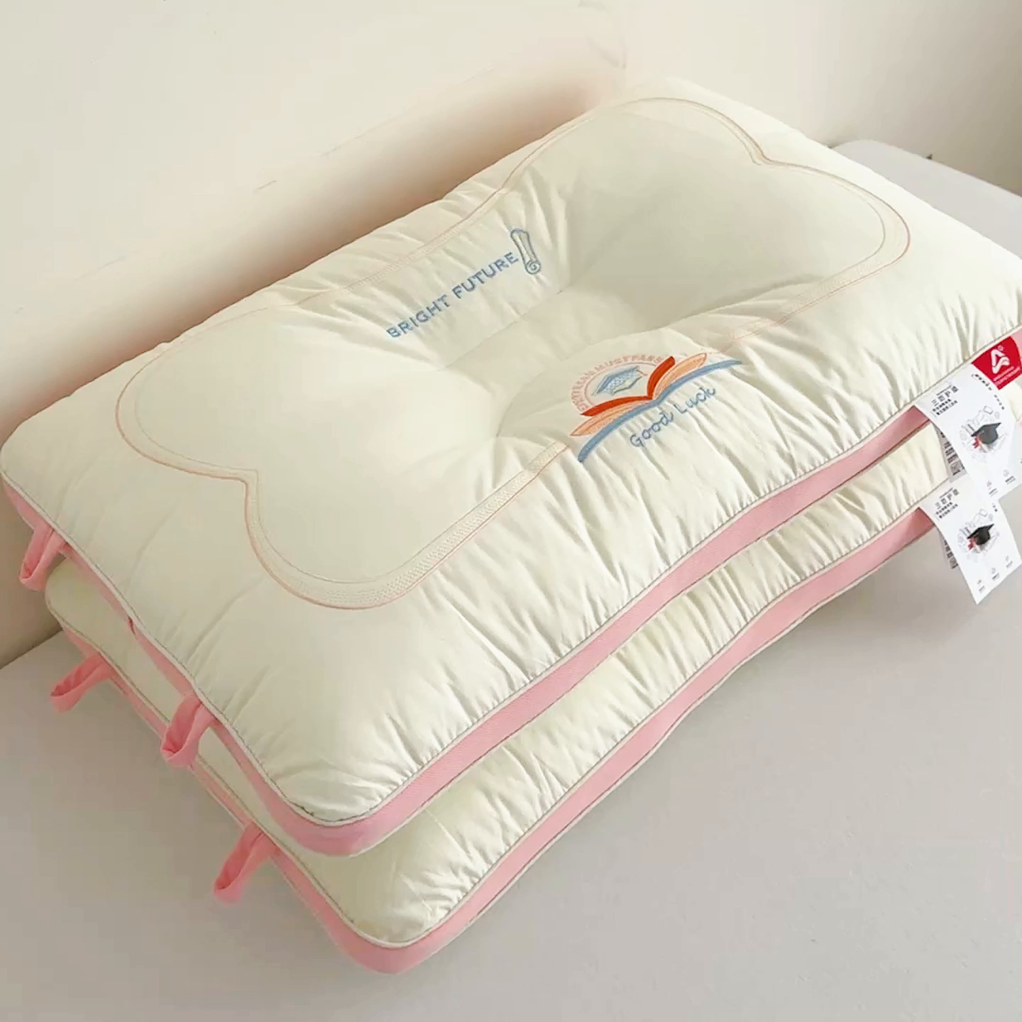 91家纺网 家纺一手货源 找家纺 麦肯锡 2025新款A类三防全棉护颈亲子枕 粉色