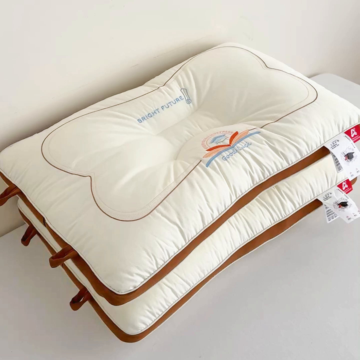 91家纺网 家纺一手货源 找家纺 麦肯锡 2025新款A类三防全棉护颈亲子枕 咖色