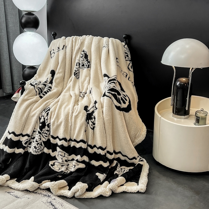 91家纺网 家纺一手货源 找家纺 美洲琳 2025新款羊羔绒复合简约现代休闲毯 蝴蝶