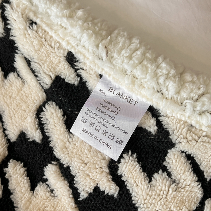 91家纺网 家纺一手货源 找家纺 美洲琳 2025新款羊羔绒复合简约现代休闲毯 千鸟格