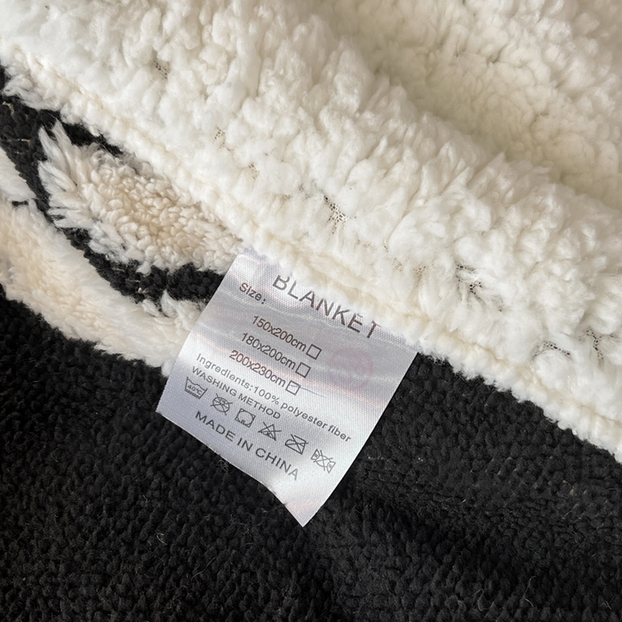 91家纺网 家纺一手货源 找家纺 美洲琳 2025新款羊羔绒复合简约现代休闲毯 山茶花