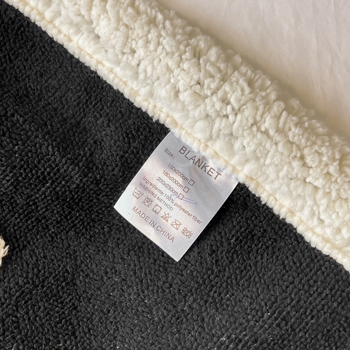 91家纺网 家纺一手货源 找家纺 美洲琳 2025新款羊羔绒复合简约现代休闲毯 熊猫