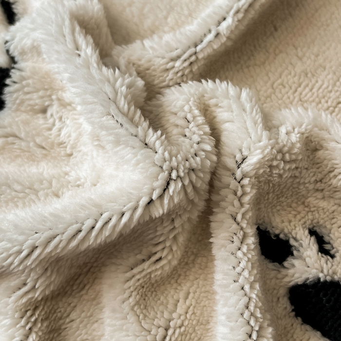 91家纺网 家纺一手货源 找家纺 美洲琳 2025新款羊羔绒复合简约现代休闲毯 熊猫