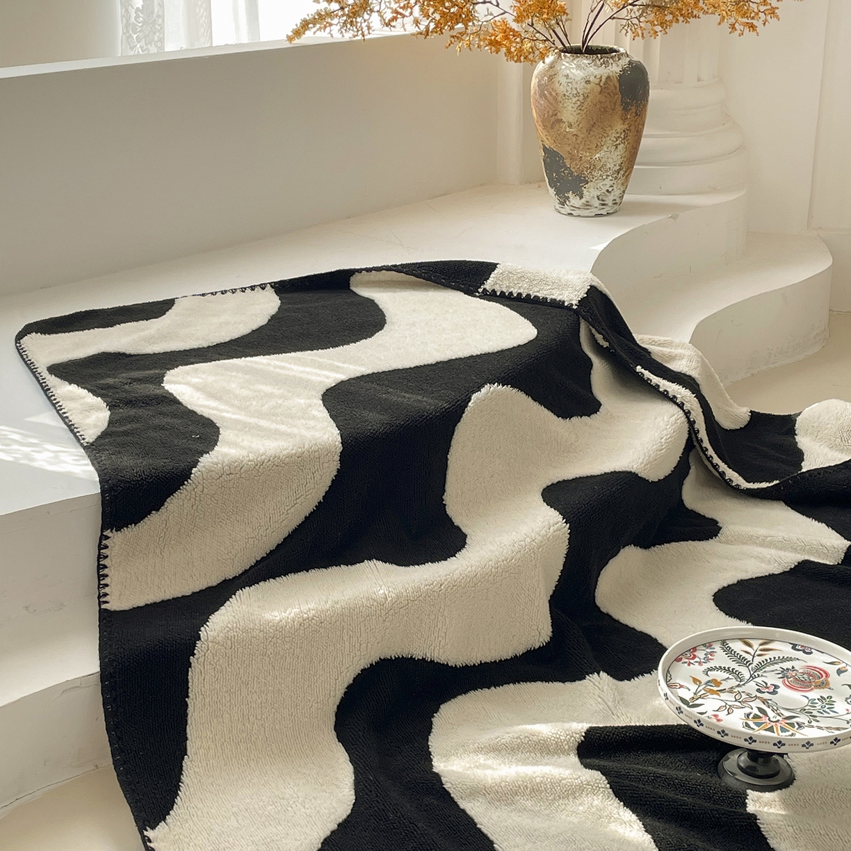 91家纺网 家纺一手货源 找家纺 （总）十里居 2025新款双面印花舒棉绒毛毯多功能盖毯沙发毯跨境毛毯