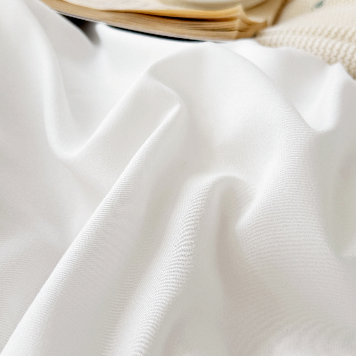 91家纺网 家纺一手货源 找家纺 纽维斯 2025新款水洗棉云朵棉纯色双拼磨毛四件套 奶白蓝灰