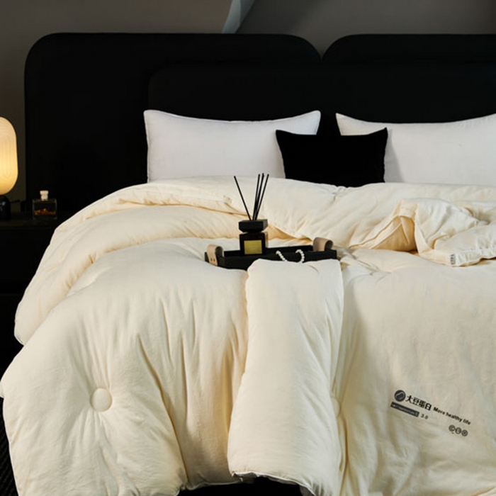 91家纺网 家纺一手货源 找家纺 蓝雀翎 2025新款原棉提花大豆被被子被芯 奶油白