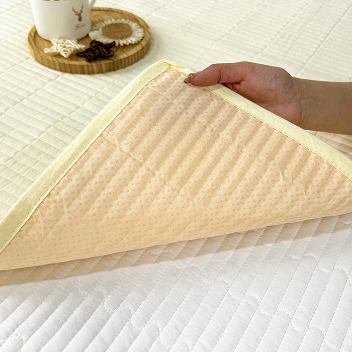 91家纺网 家纺一手货源 找家纺 拾小柒 2025年新款全棉色织水洗棉隔脏姨妈垫护理垫床盖 鹅黄色 防水款