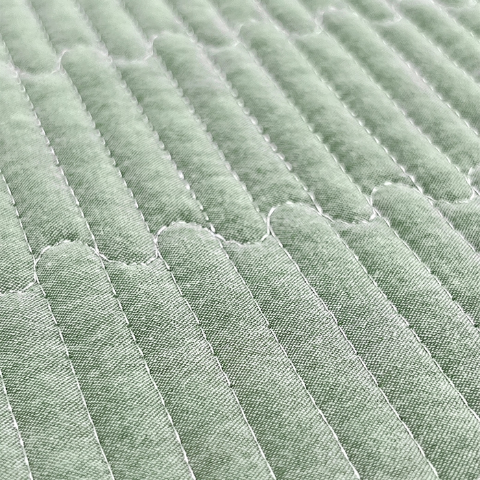 91家纺网 家纺一手货源 找家纺 拾小柒 2025新款全棉色织水洗棉夹棉防滑床盖防水纯色床护垫 防滑款浅绿色